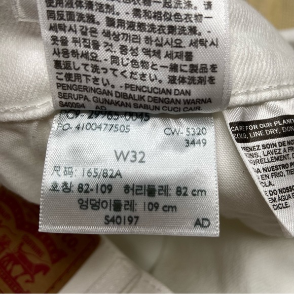 LEVI’S White Distressed Denim Mid Length Shorts - Picture 6 of 13